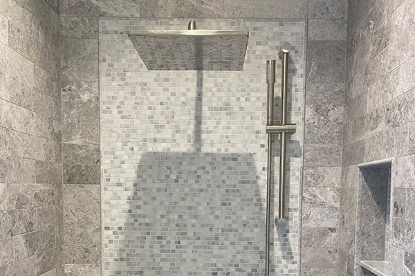 Masterful shower close up with tile work